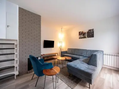 Ein Sitzbereich in der Unterkunft Spacious holiday home in Hambachtal Resort