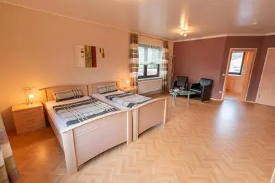 Ein Bett oder Betten in einem Zimmer der Unterkunft Gästehaus Franzmann