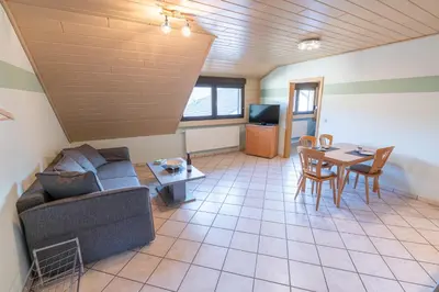 Ein Sitzbereich in der Unterkunft Gästehaus Franzmann