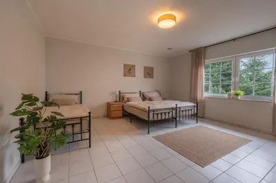 Ein Bett oder Betten in einem Zimmer der Unterkunft Ferienhaus Michel Andernach