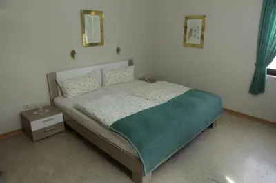 Ein Bett oder Betten in einem Zimmer der Unterkunft Pension Schiffer