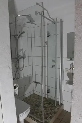 Ein Badezimmer in der Unterkunft Pension Schiffer