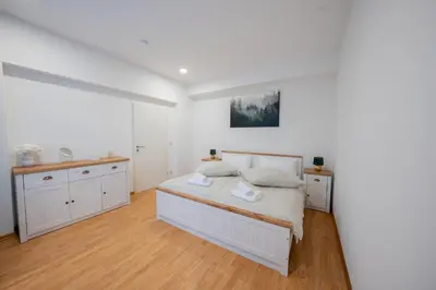 Ein Bett oder Betten in einem Zimmer der Unterkunft Central Gerolstein Panorama Apartment