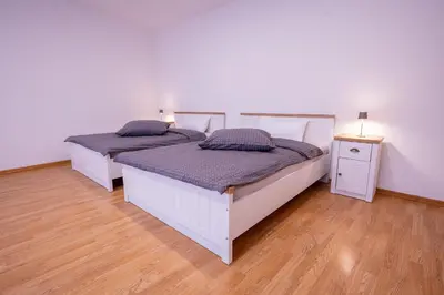 Ein Bett oder Betten in einem Zimmer der Unterkunft Central Gerolstein Panorama Apartment