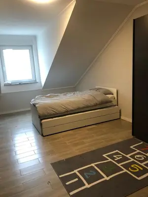 Ein Bett oder Betten in einem Zimmer der Unterkunft Ahornweg