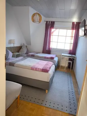 Ein Bett oder Betten in einem Zimmer der Unterkunft Ferien-Monteurunterkunft Andernach