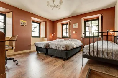 Ein Bett oder Betten in einem Zimmer der Unterkunft Landhaus Waldeifel - 18 Personen
