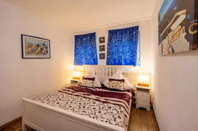 Ein Bett oder Betten in einem Zimmer der Unterkunft Ferienwohnung Vulkaneifel
