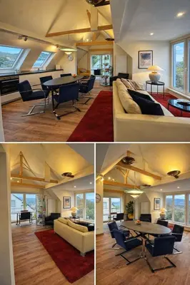 Ein Sitzbereich in der Unterkunft Sonnige Design-Dachwohnung mit Fernblick
