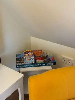 Ein Sitzbereich in der Unterkunft Sonnige Design-Dachwohnung mit Fernblick
