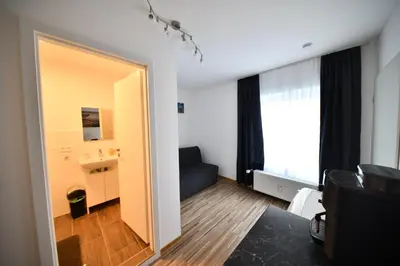 Ein Sitzbereich in der Unterkunft Koblenz City Center Apartments