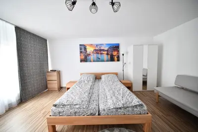 Ein Bett oder Betten in einem Zimmer der Unterkunft Koblenz City Center Apartments