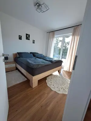 Ein Bett oder Betten in einem Zimmer der Unterkunft Ferienwohnung Hahnenblick