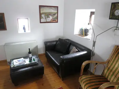 Ein Sitzbereich in der Unterkunft Ferienwohnungen Haus Hinneres