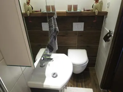 Ein Badezimmer in der Unterkunft Ferienwohnungen Haus Hinneres
