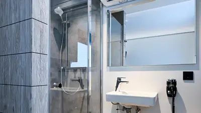 Ein Badezimmer in der Unterkunft Roatel Waldlaubersheim A61 my-roatel-com