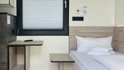 Ein Bett oder Betten in einem Zimmer der Unterkunft Roatel Waldlaubersheim A61 my-roatel-com