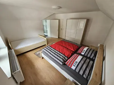 Ein Bett oder Betten in einem Zimmer der Unterkunft Ferienwohnung Zur Lore