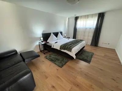Ein Bett oder Betten in einem Zimmer der Unterkunft Landruhe Koblenz- Modernes Apartment