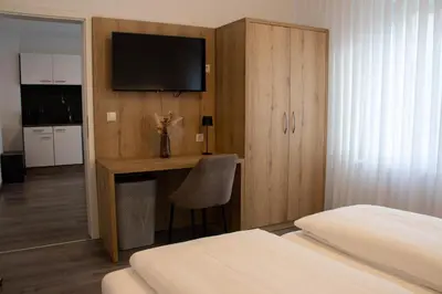 Ein Bett oder Betten in einem Zimmer der Unterkunft Ahrpartments-Altenahr