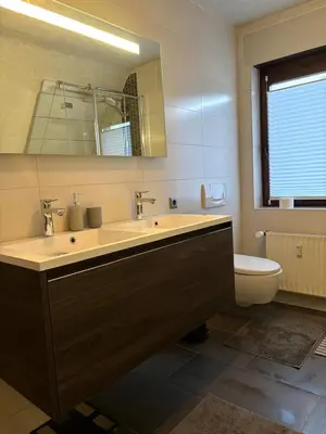 Ein Badezimmer in der Unterkunft NringRooms RingQuartier