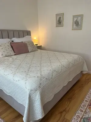 Ein Bett oder Betten in einem Zimmer der Unterkunft Ferienwohnung Blerta