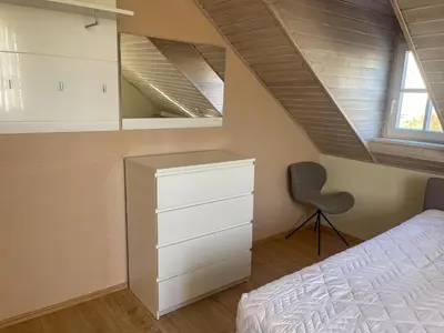 Ein Bett oder Betten in einem Zimmer der Unterkunft Ferienwohnung Sonnentälchen