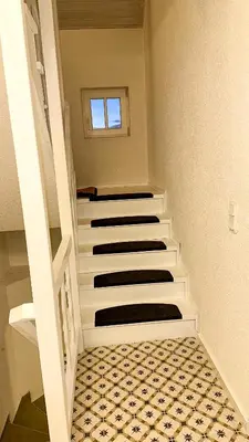 Ein Bett oder Betten in einem Zimmer der Unterkunft Ferienwohnung Sonnentälchen