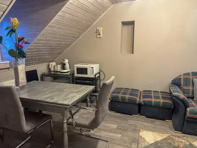 Ein Sitzbereich in der Unterkunft Ferienwohnung Sonnentälchen