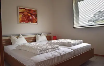 Ein Bett oder Betten in einem Zimmer der Unterkunft Nice Home In Gerolsteinhinterhausen