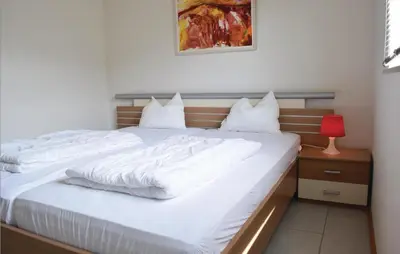 Ein Bett oder Betten in einem Zimmer der Unterkunft Nice Home In Gerolsteinhinterhausen