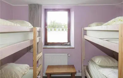 Ein Bett oder Betten in einem Zimmer der Unterkunft Nice Home In Lünebach With Kitchen