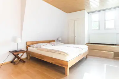 Ein Bett oder Betten in einem Zimmer der Unterkunft Guesthouse Altes Rathaus