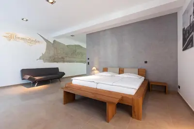 Ein Bett oder Betten in einem Zimmer der Unterkunft Guesthouse Altes Rathaus