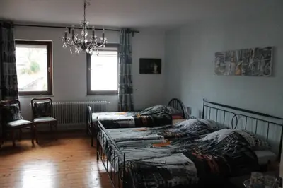 Ein Bett oder Betten in einem Zimmer der Unterkunft Pension Rodenburg