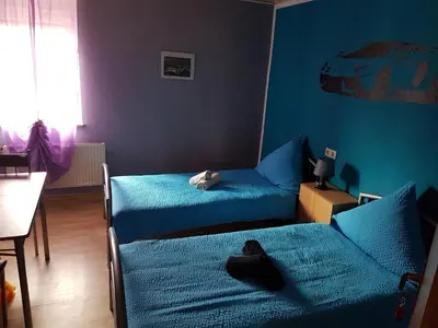Ein Bett oder Betten in einem Zimmer der Unterkunft Ring-Speed Motorsport