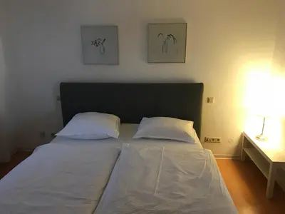 Ein Bett oder Betten in einem Zimmer der Unterkunft Monteure Apartment Roxheim