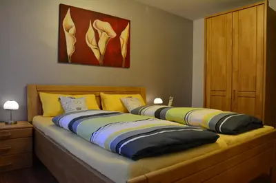 Ein Bett oder Betten in einem Zimmer der Unterkunft Ferienwohnung Hedi