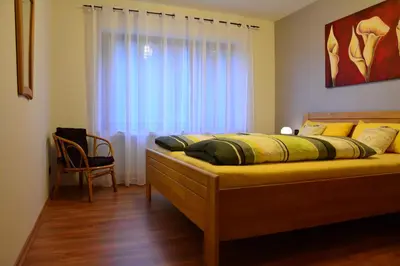 Ein Bett oder Betten in einem Zimmer der Unterkunft Ferienwohnung Hedi