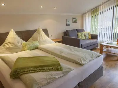Ein Bett oder Betten in einem Zimmer der Unterkunft Ferienweingut Stein