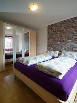 Ein Bett oder Betten in einem Zimmer der Unterkunft Benkelberg