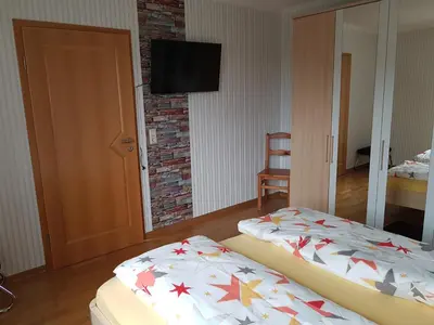 Ein Bett oder Betten in einem Zimmer der Unterkunft Benkelberg