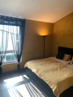 Ein Bett oder Betten in einem Zimmer der Unterkunft Ferienhaus Alte Kaserne