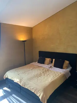 Ein Bett oder Betten in einem Zimmer der Unterkunft Ferienhaus Alte Kaserne