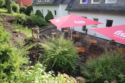 Ein Garten an der Unterkunft Hotel Vintage Am Bundesbank-Bunker