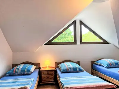 Ein Bett oder Betten in einem Zimmer der Unterkunft Apartment Ferienapartments Adenau-4 by Interhome