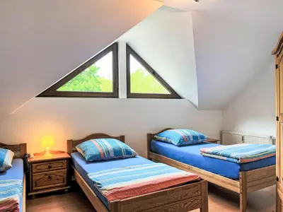 Ein Bett oder Betten in einem Zimmer der Unterkunft Apartment Ferienapartments Adenau-4 by Interhome