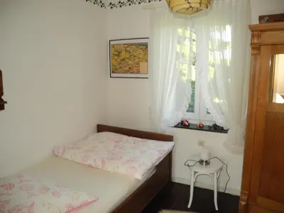 Ein Bett oder Betten in einem Zimmer der Unterkunft Villa Luzia