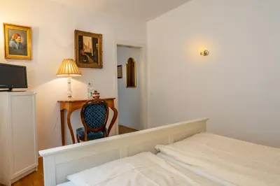 Ein Bett oder Betten in einem Zimmer der Unterkunft Romantisches Hotel zur Post