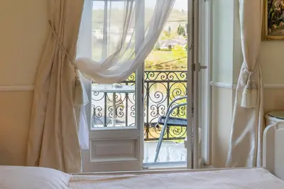 Ein Bett oder Betten in einem Zimmer der Unterkunft Romantisches Hotel zur Post